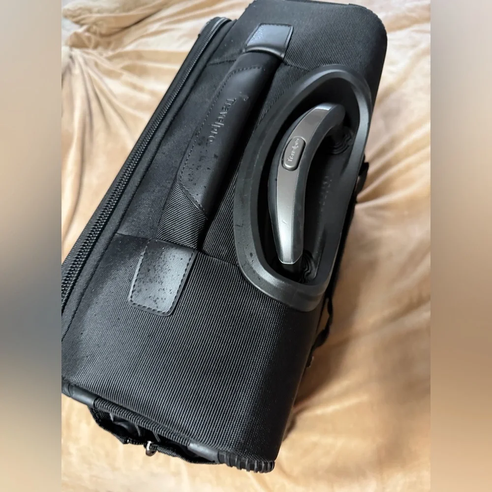 Travelpro black rolling